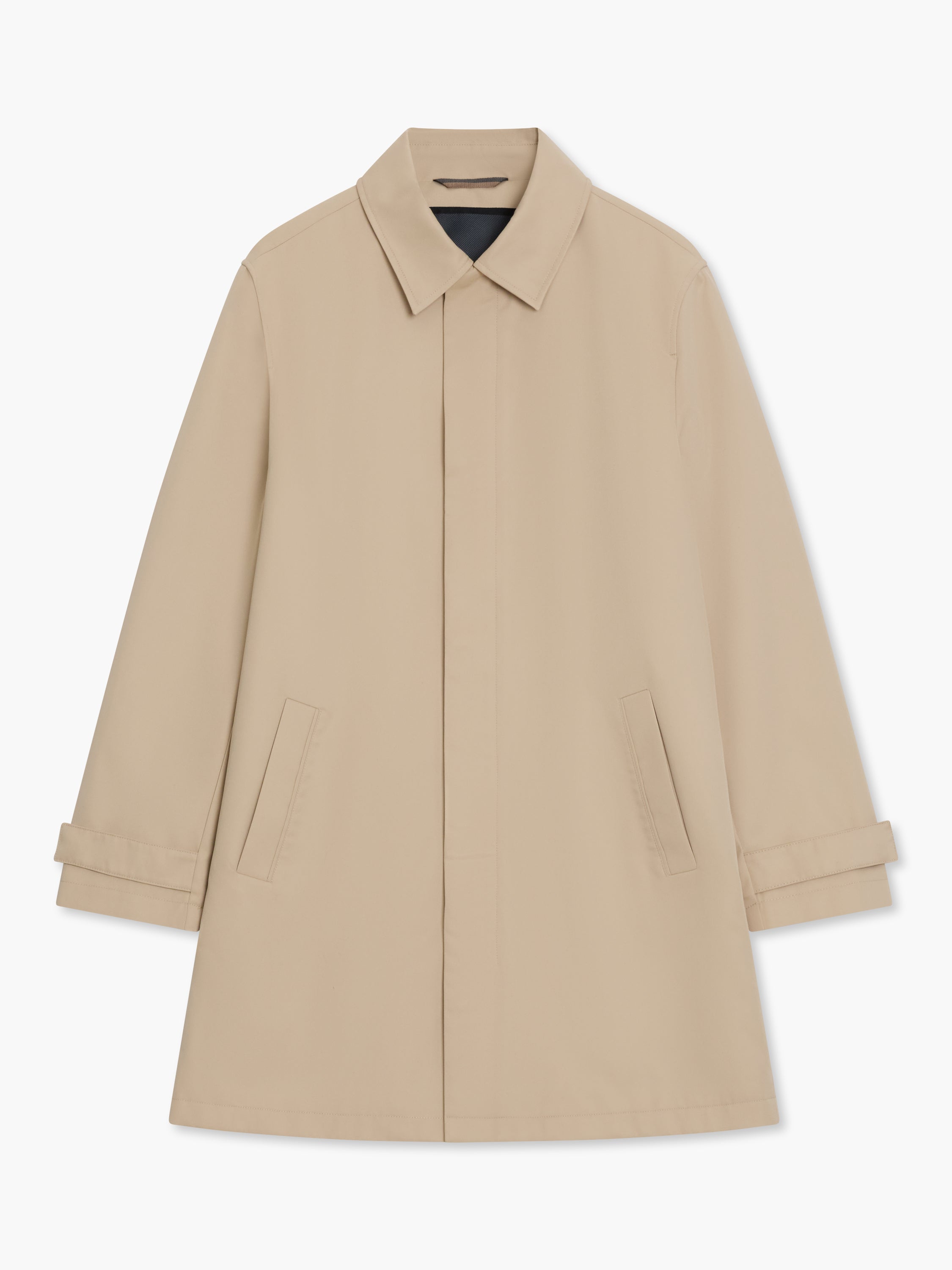 A beige long sleeve mac coat with concealed fastening